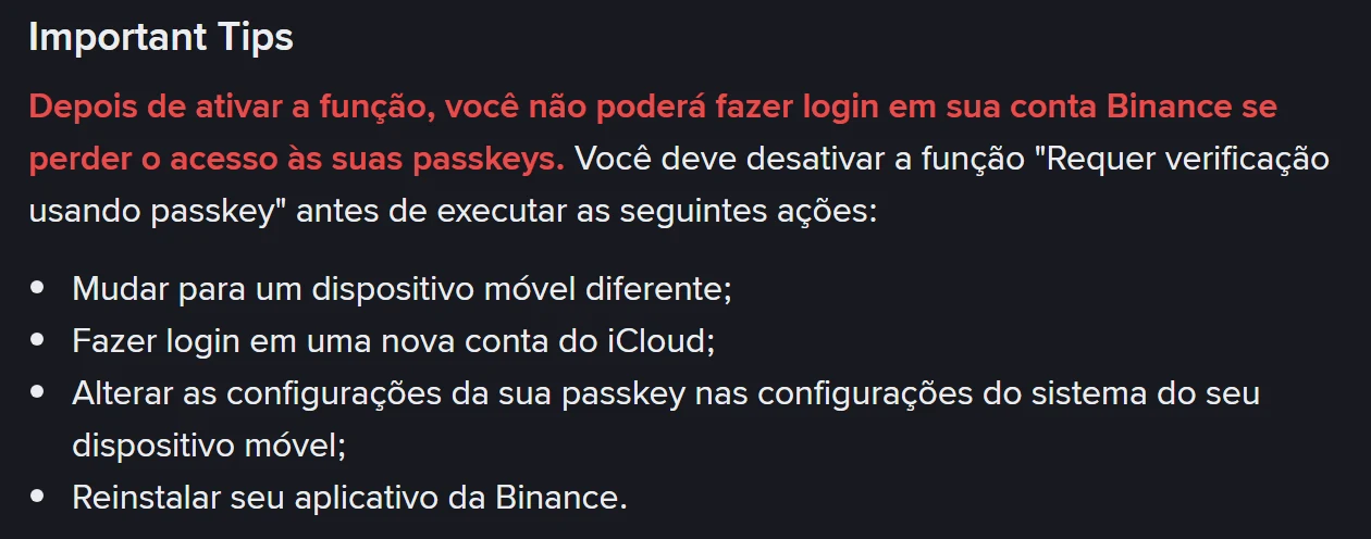 Bloco "Important Tips" da página oficial da Binance em português, com o alerta em vermelho sobre não conseguir fazer login ao perder as passkeys e a lista de quatro ações que exigem desativar a função antes: mudar para um dispositivo móvel diferente, fazer login em uma nova conta do iCloud, alterar as configurações da passkey nas configurações do sistema do dispositivo móvel e reinstalar o aplicativo da Binance